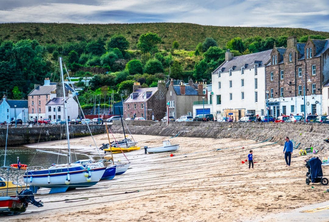 Stonehaven beach with houses around the bay