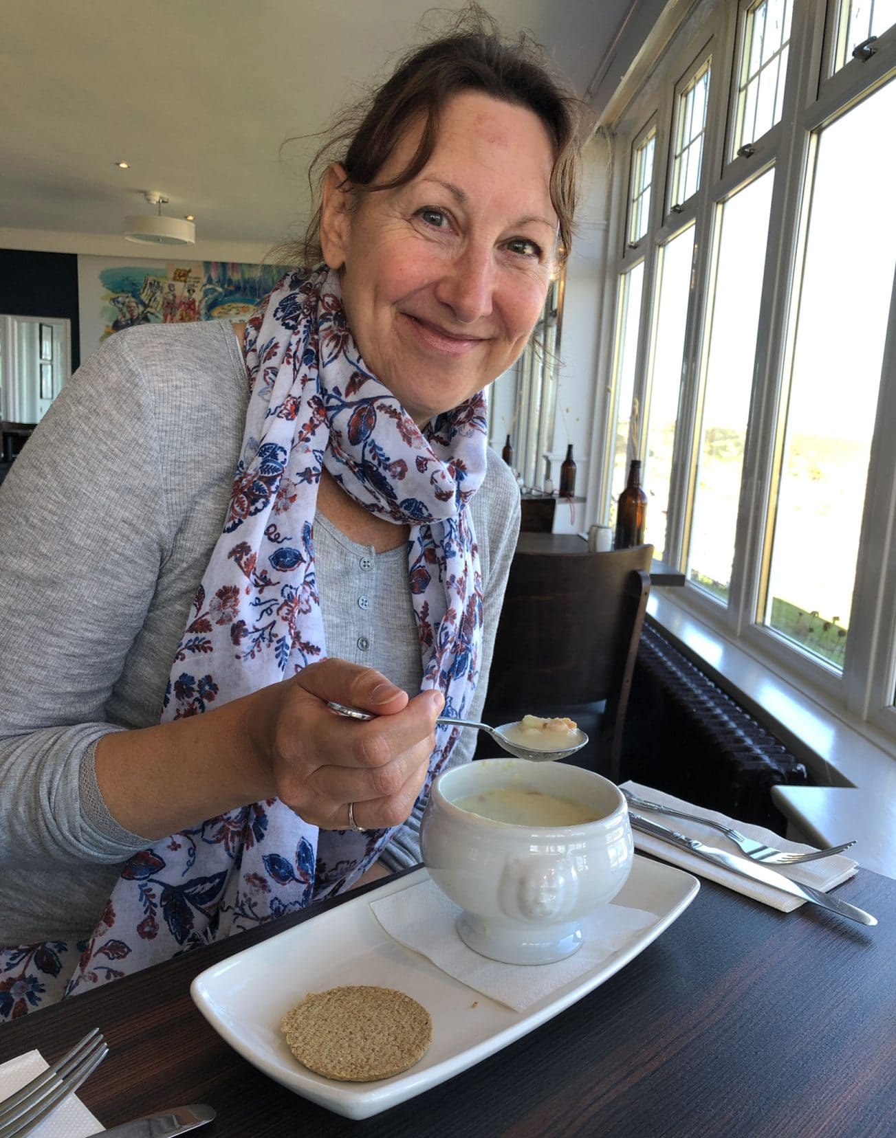 Shelley eating Cullen Skink soup in Cullen