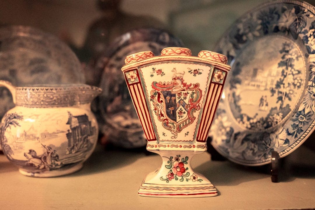 A red and white porcelain tulip holder