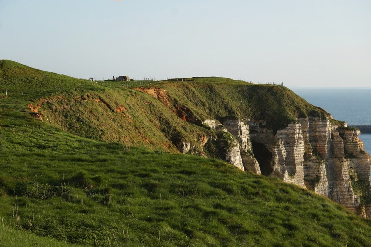 Normandy cliff face with sun setting