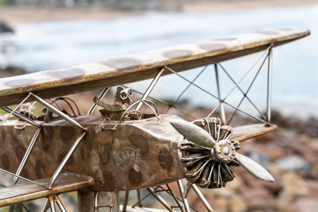 small model airplane made of metal scraps 