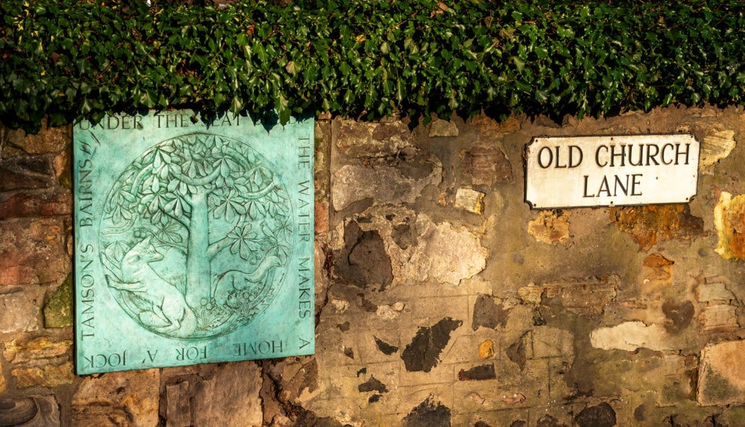 Plaque on old Church road