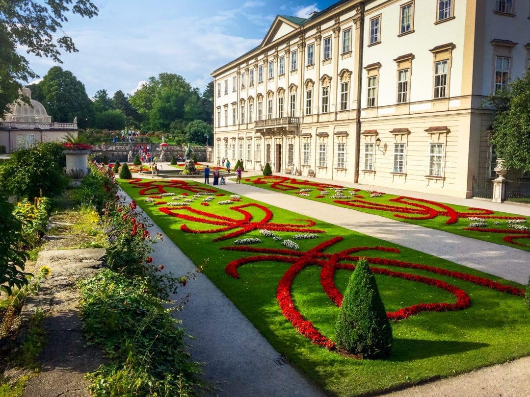 Mirabel Gardens, Salzburg with green lawn with Red flower designs