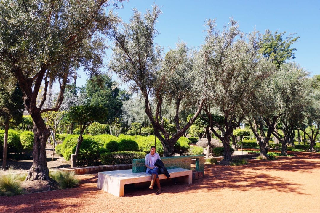 Sheley sat on a bench in a park in Marrakech