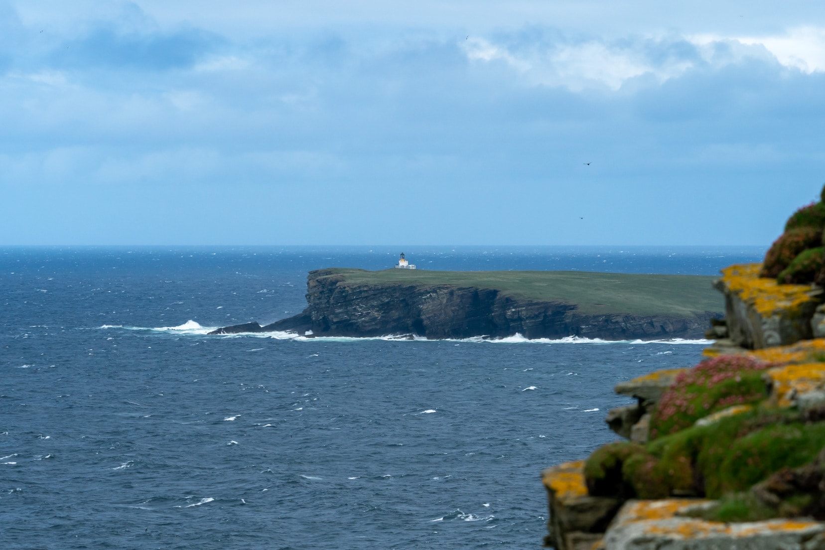 Brough of Birsay view from Marwick Head - a small island with a lighthouse on the top