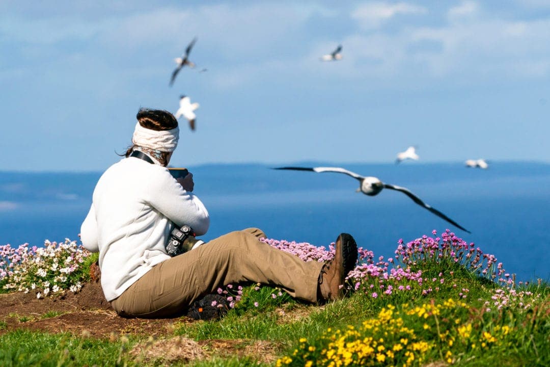 Shelley-taking-photos-of-gannets-Troup-Head