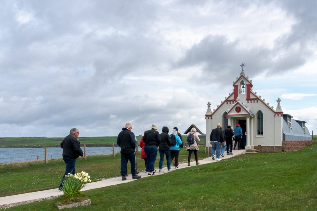 Queue of tourists waiting to enter the Italian chapel