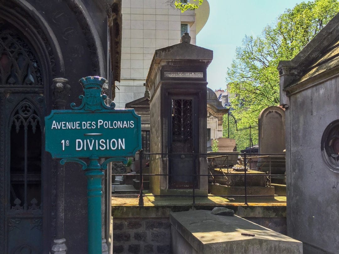 Sign post marking Montmarte cemetery divisions 