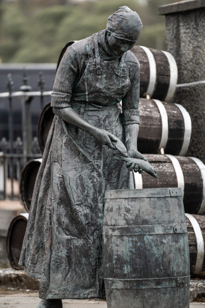 Statue of a fisherwoman in Stornaway Harbour