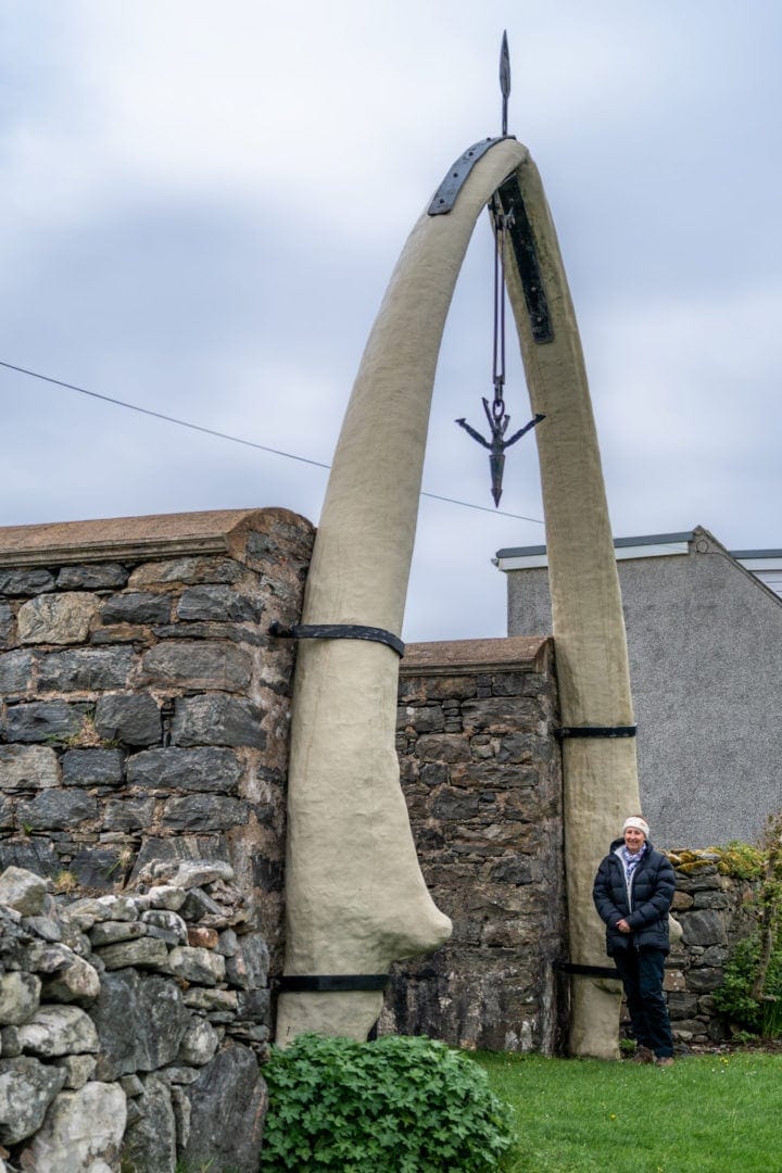 Whale bone attached to a wall as an arch 