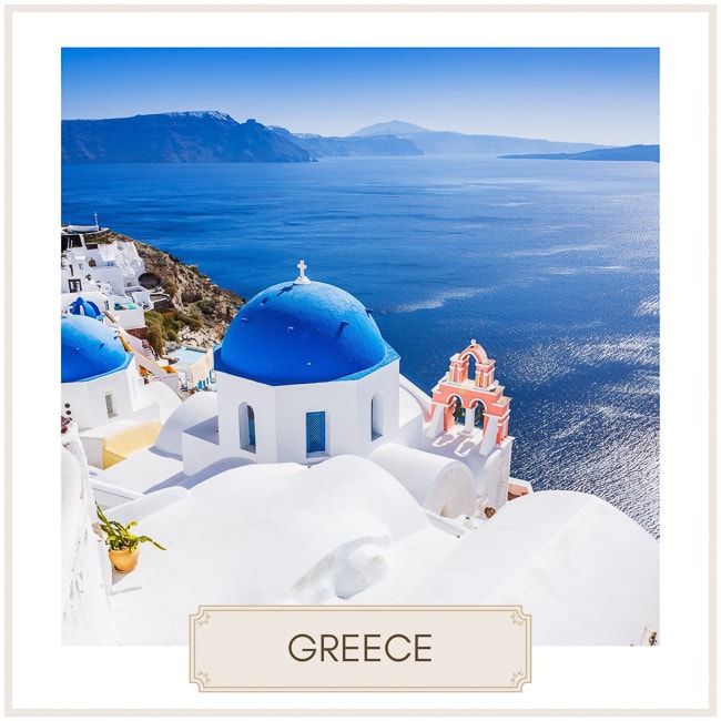 Destination Greece with image of blue and white buildings