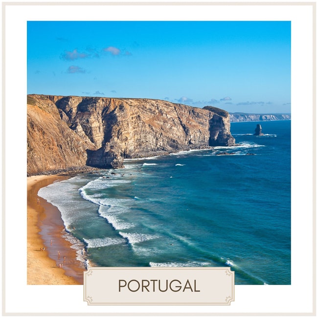 Destination Portugal with a photo of a high cliff and golden sand by the sea