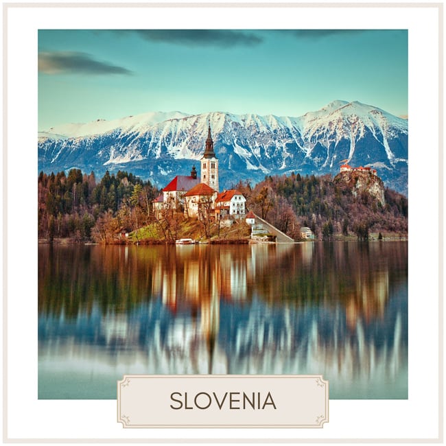 Destination slovenia image with a photo of a church in the middle of a lake