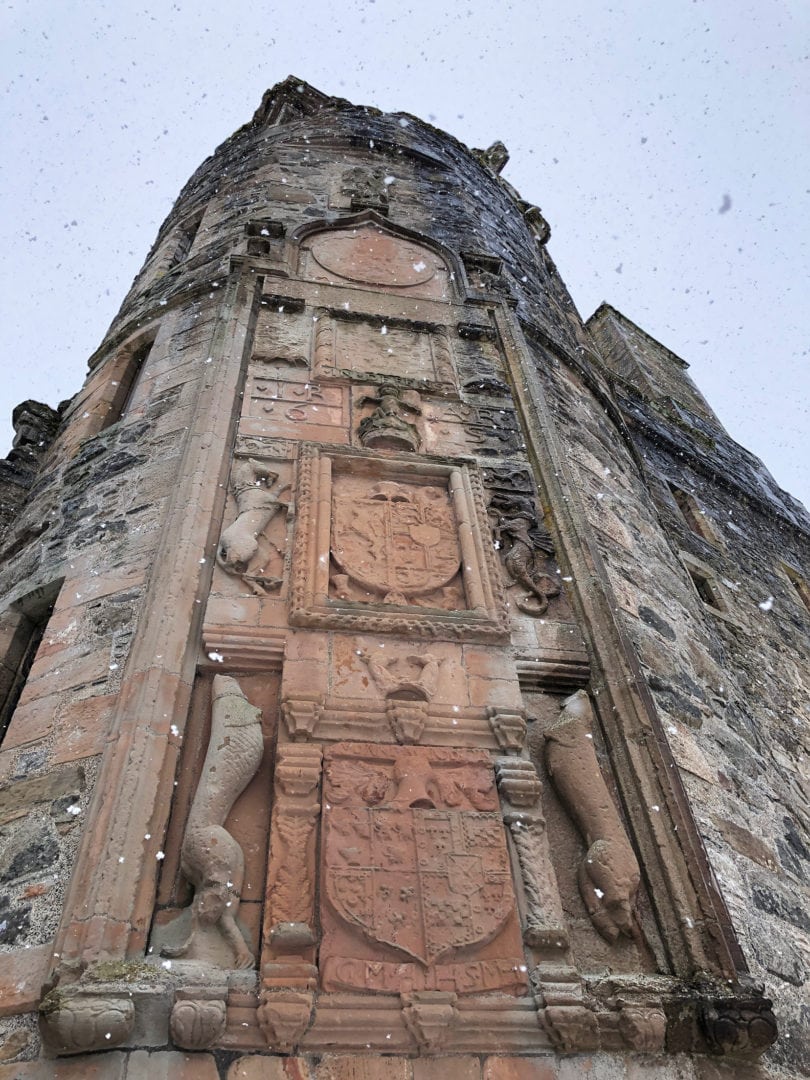 Herldic stone insrts in teh tower above door of castle