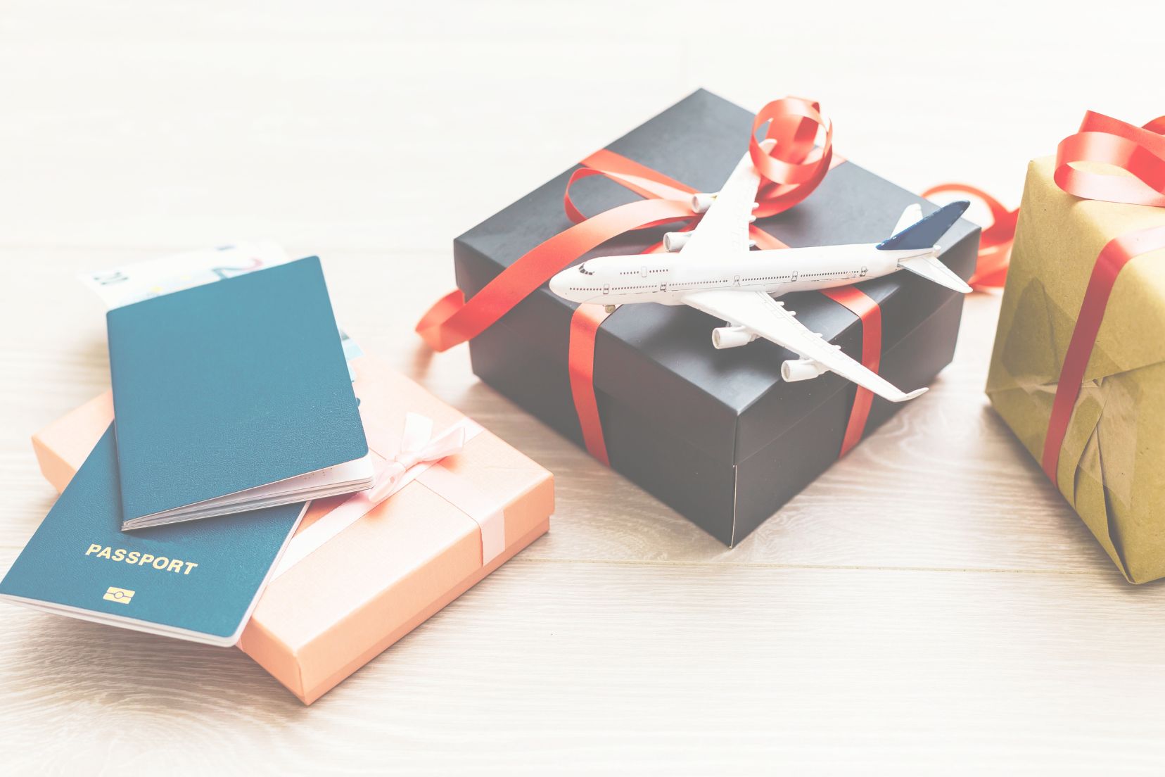 Travel Gift Image with gifts and passports beside them