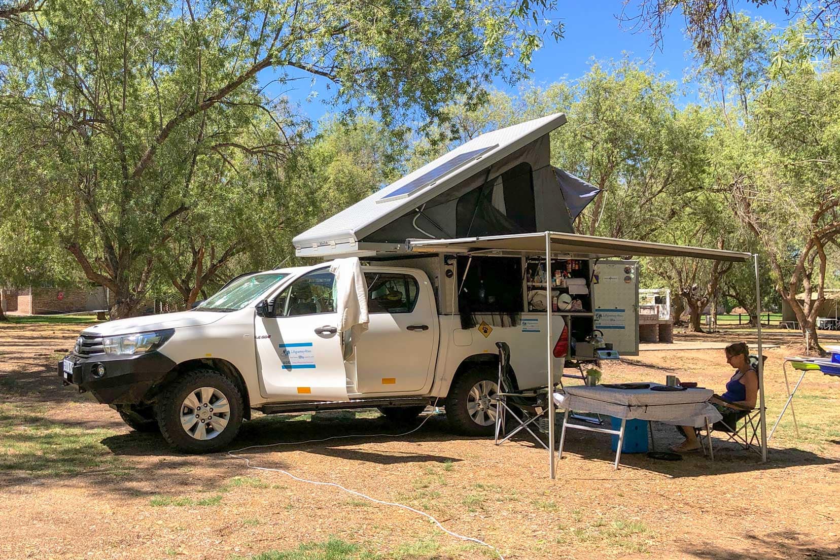 camping and relaxing under the 4x4 canopy