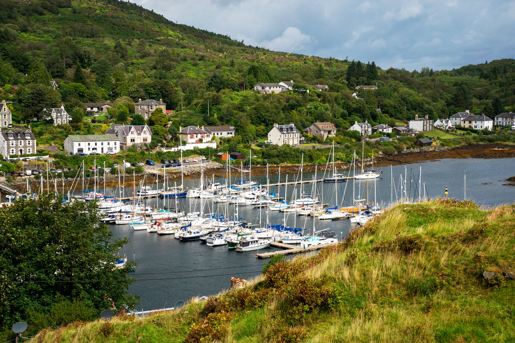 Tarbet Castle views to the yachts in the harbour