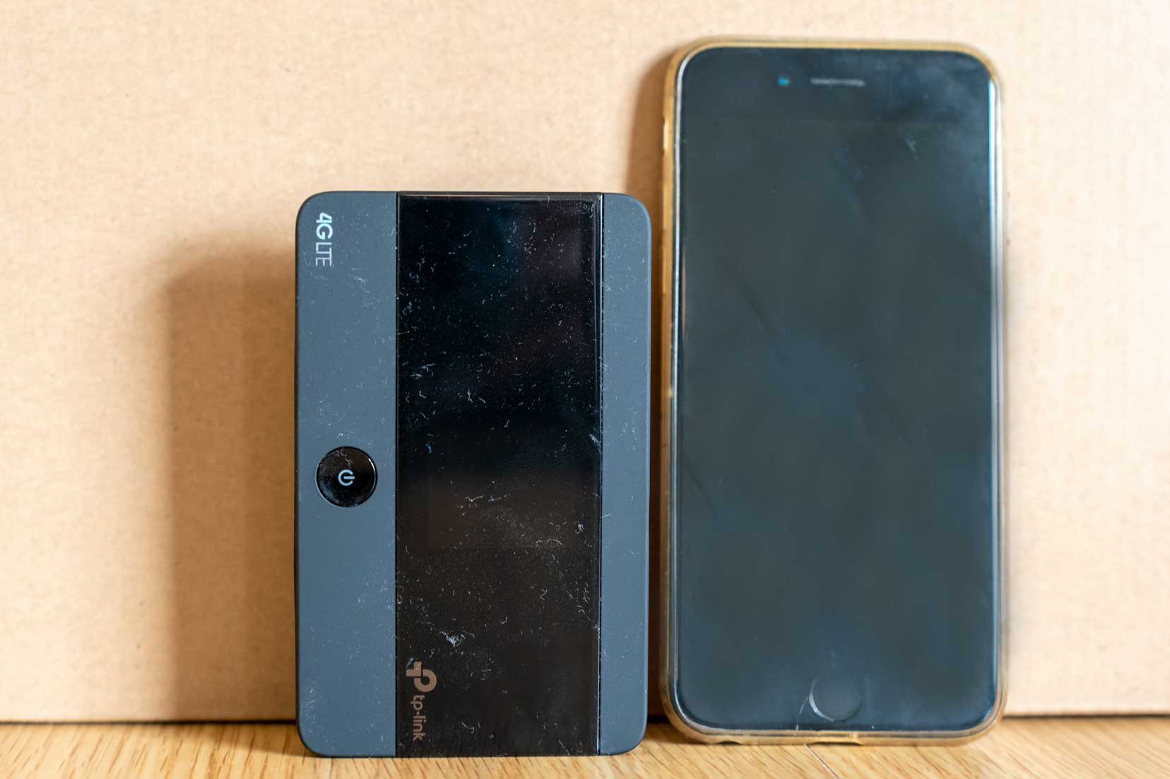 Travel wifi router compared to size of iPhone 6