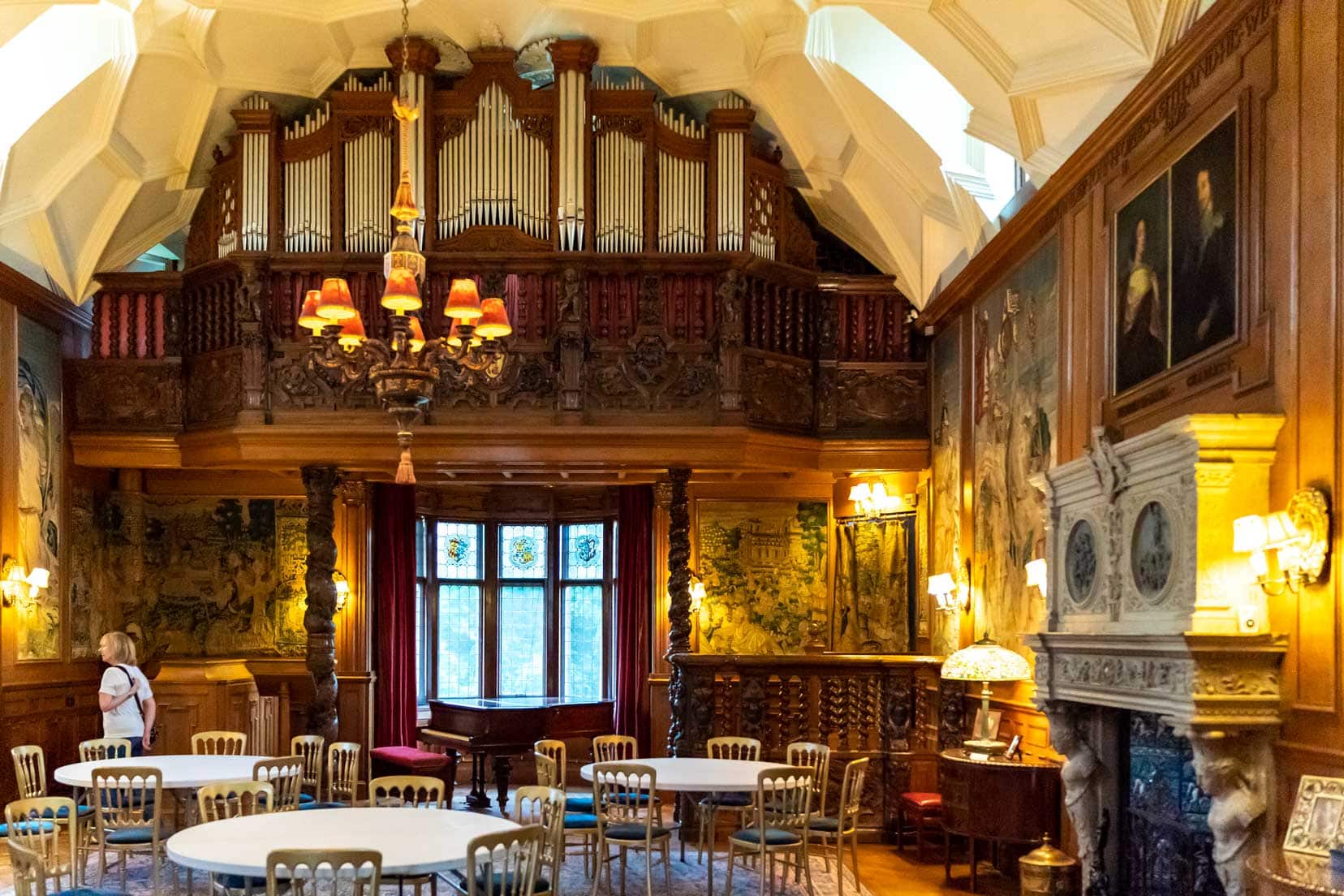 Inside Fyvie Castle with a huge organ at one end of the dining room