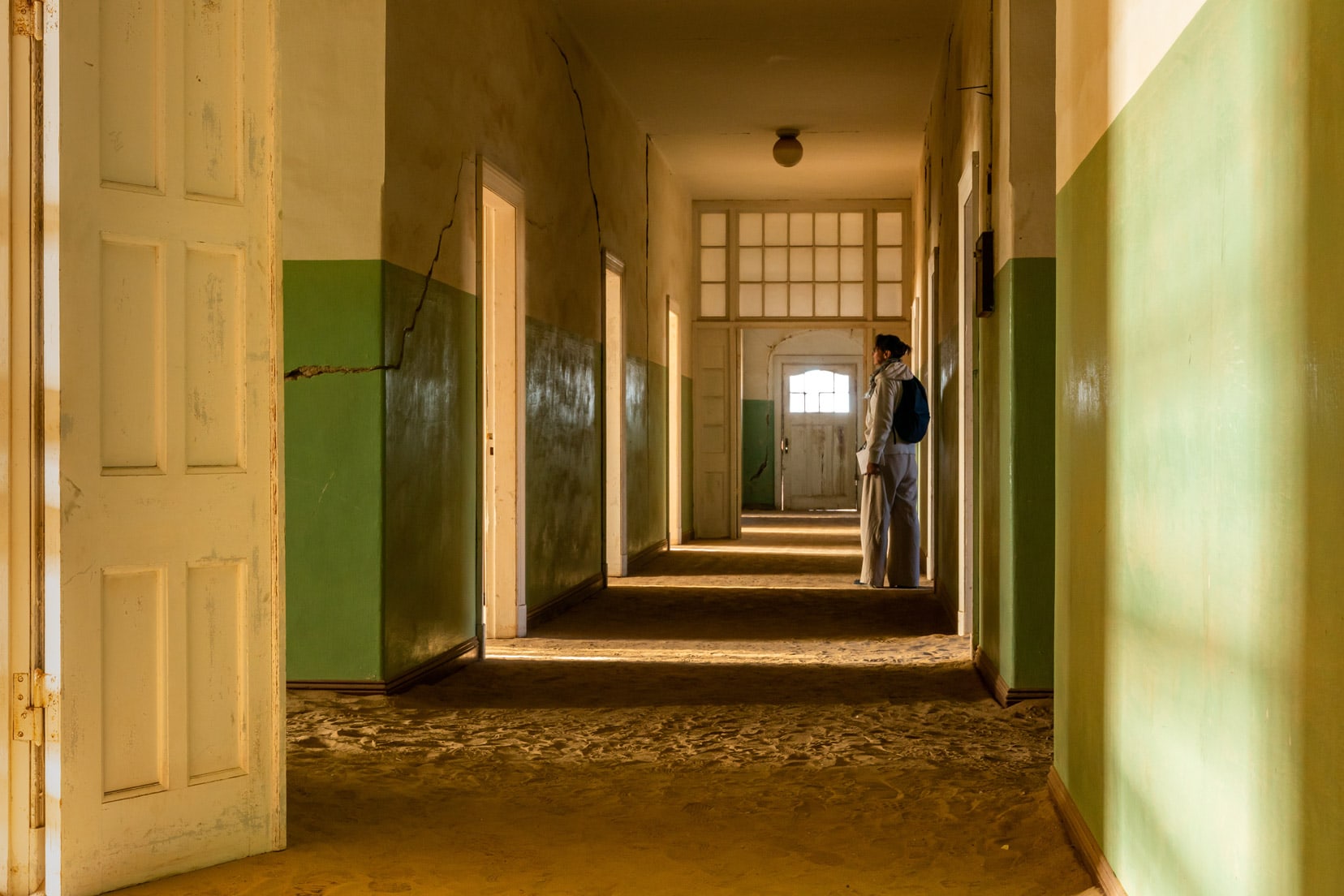 Shelley stood in hospital corridor at Kolmanskop