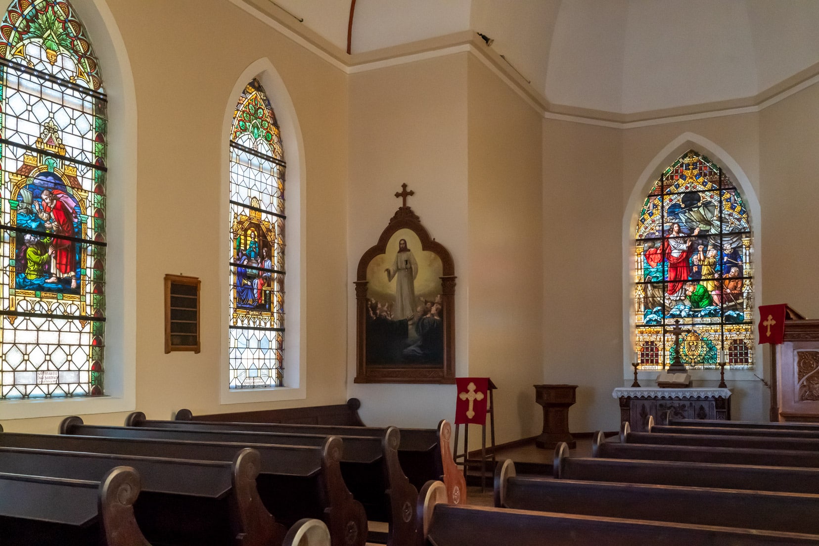 inside of the luderitz felsenkirche with stained glass windows