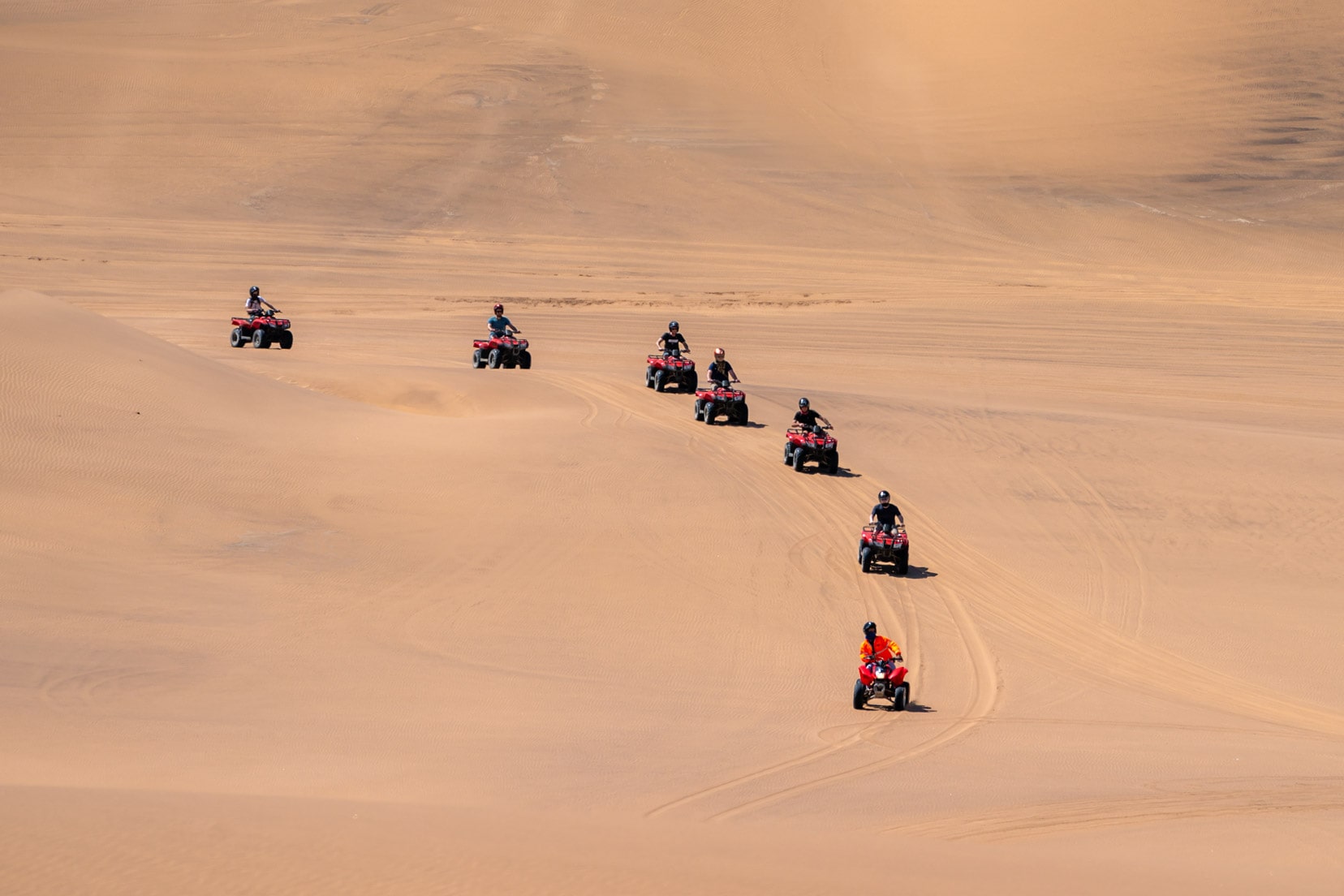 quad-bikers-in-dunes