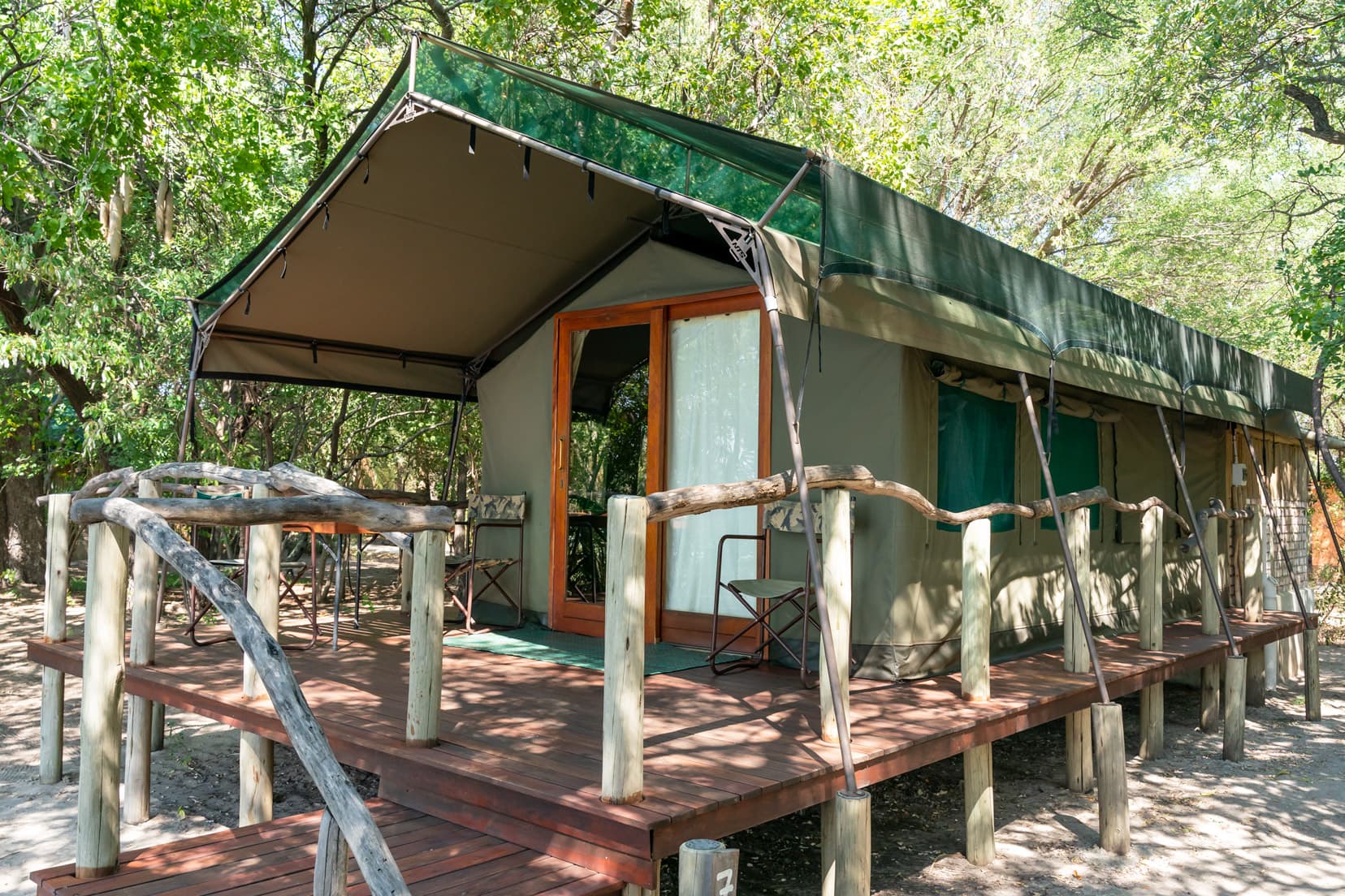 tented-accommodation with wooden deck at Ndhovu Safari Lodge