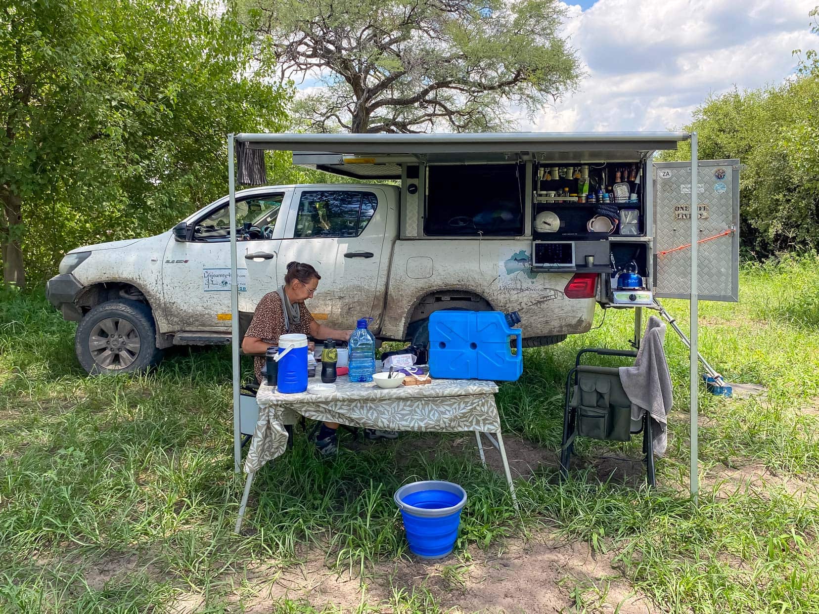 4x4 camper parked with sun shade out