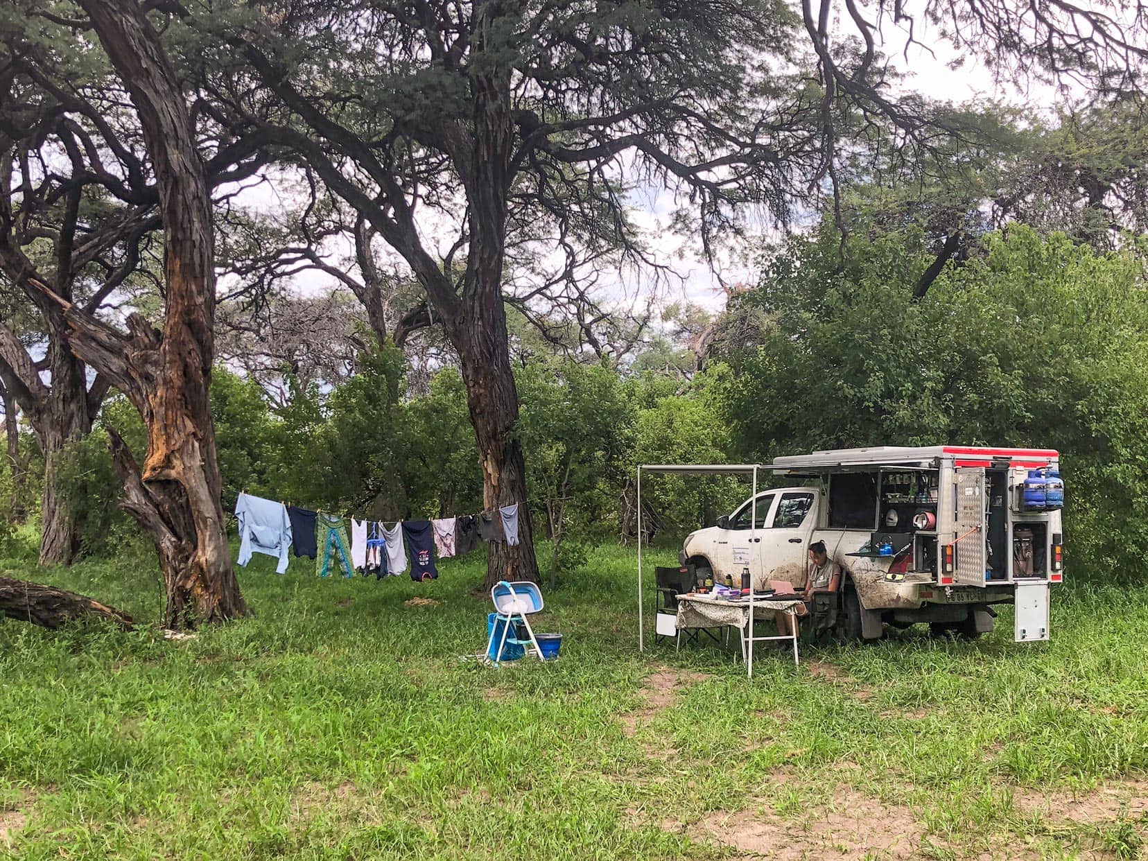 Camping-in-Khwai - 4x4 with washing hanging on rope nearby