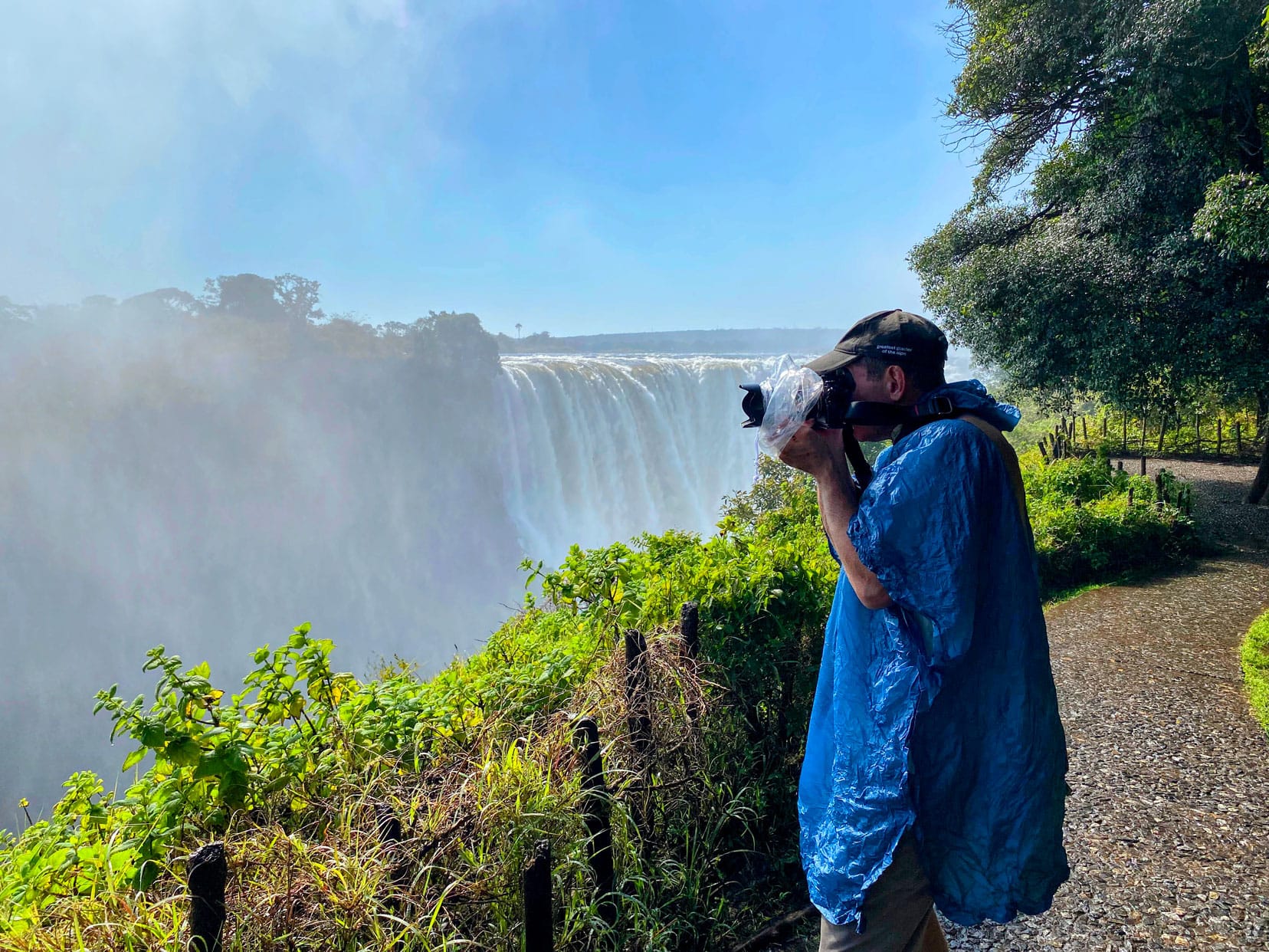 Lars with a a rain protector on his camera at Victoria Falls