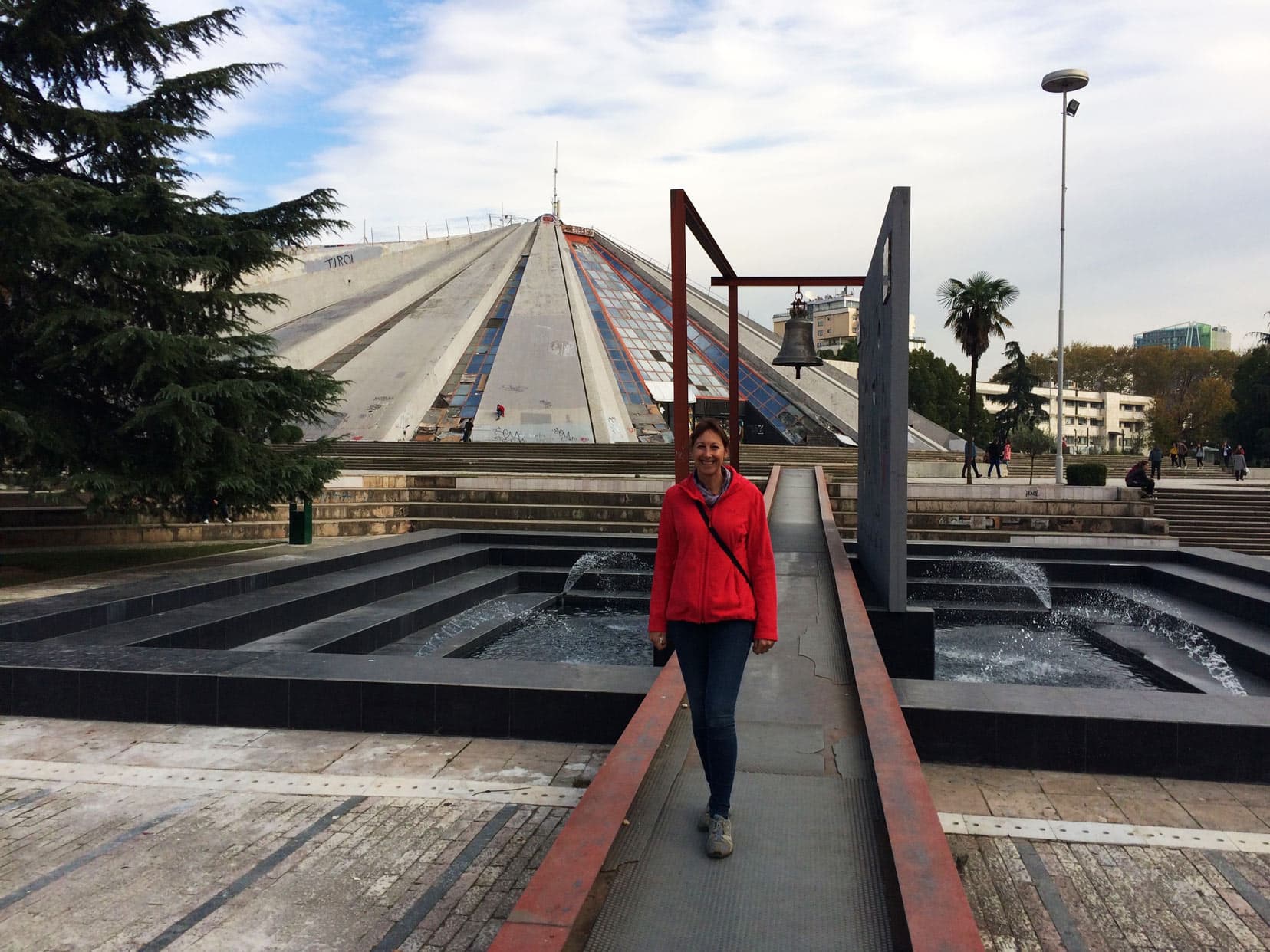 Shelley with the Pyramid of Tirana and the peace bell in the background 
