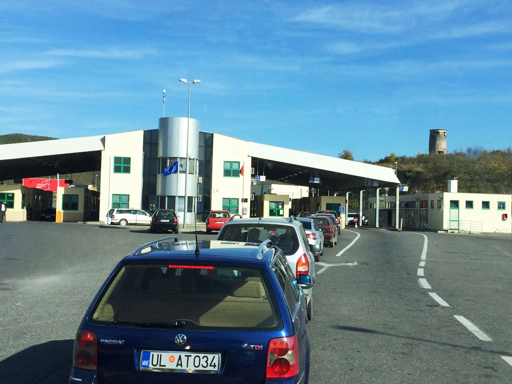 Border crossing with a queue of cars