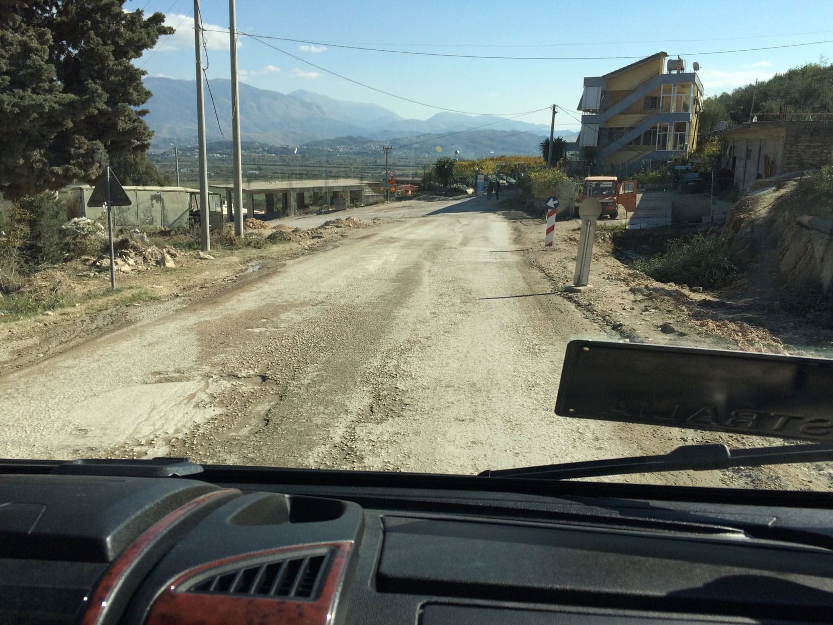 Pot holes in an Albanian road 