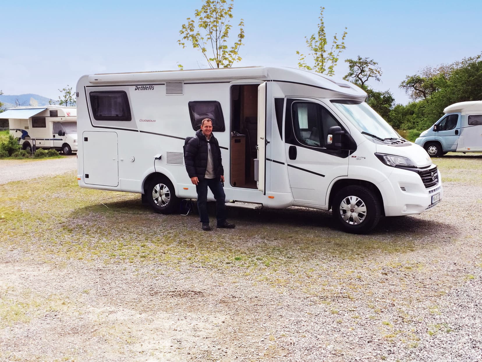 lars stood by our motorhome at our first campsite