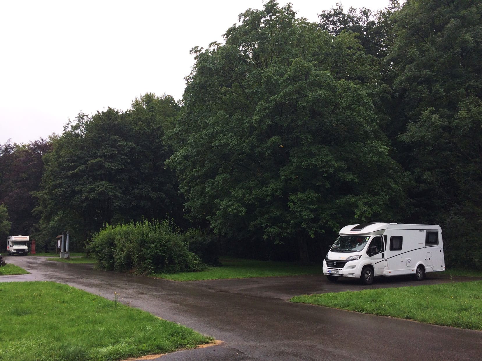 Our Motorhome parked amongst trees in a campsite 