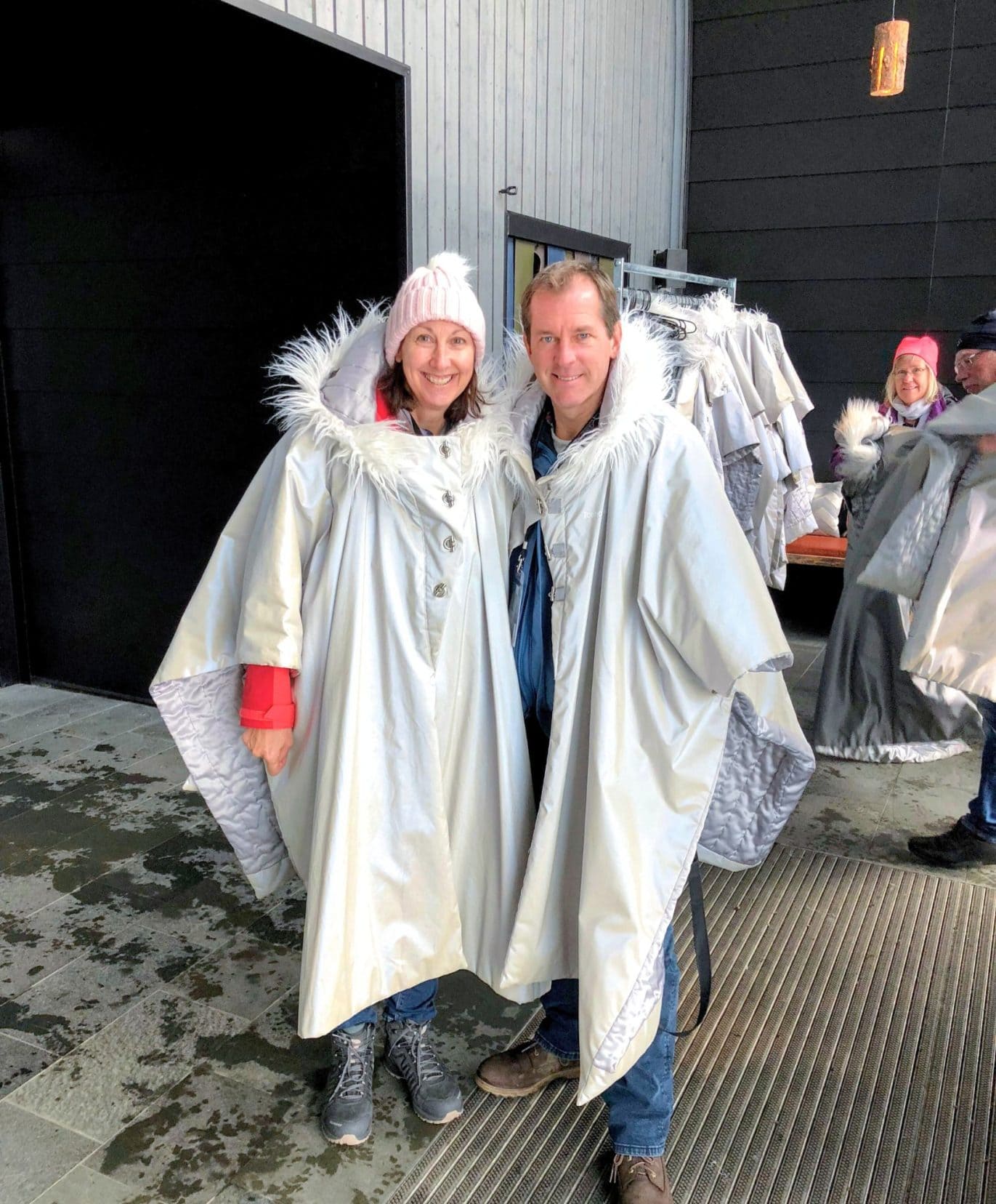 Lars and Shelley with white furlined capes on 