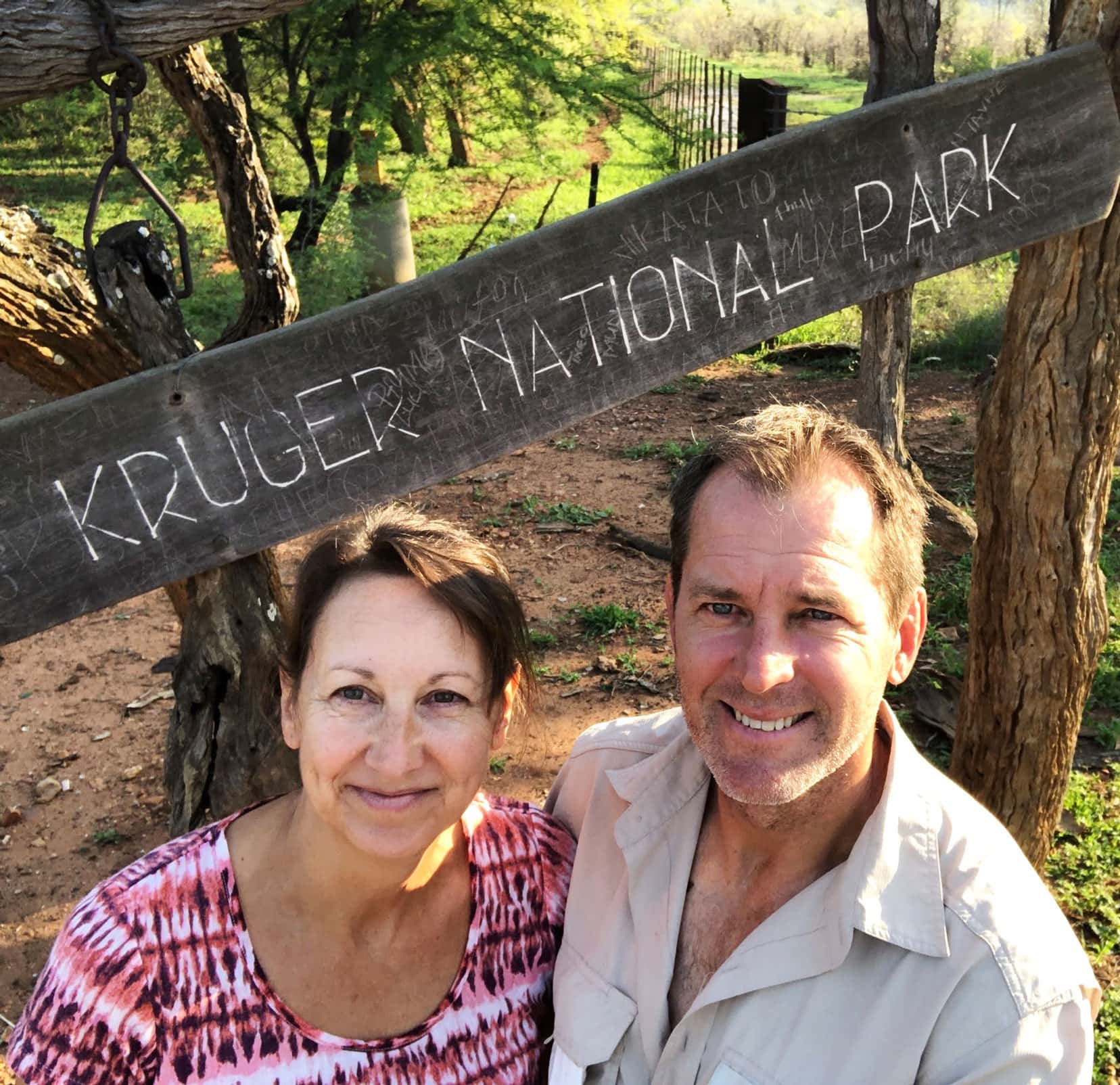 Lars and Shelley stood by the Kruger sign