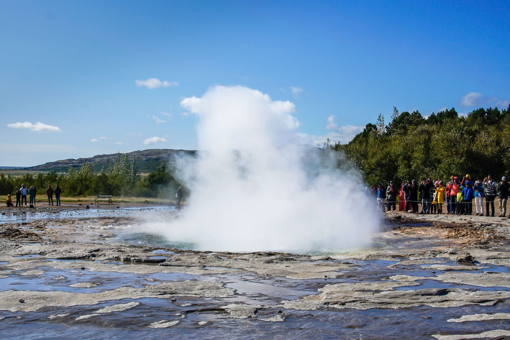 Geyser spurting up into the air in Iceland