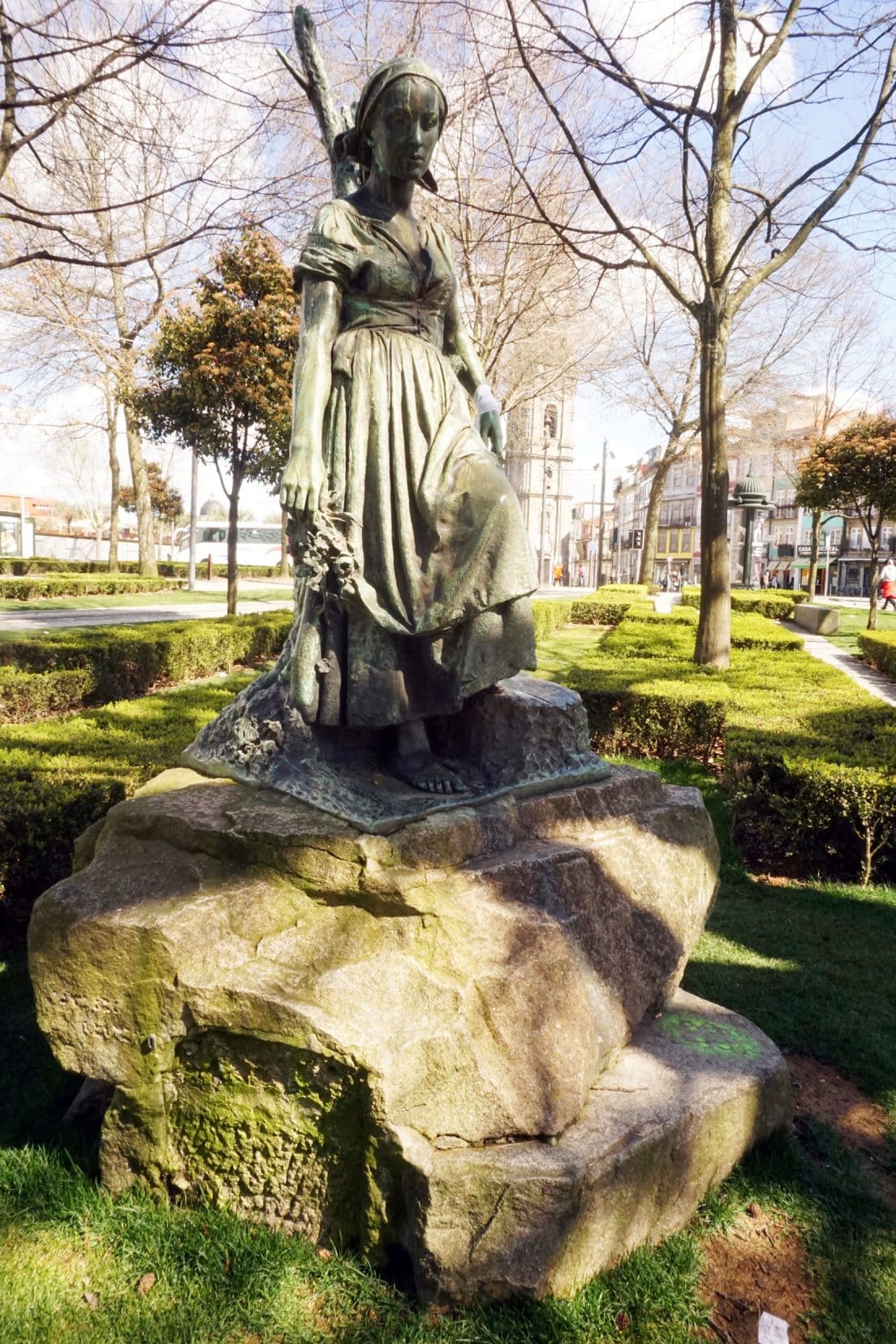 statue of a woman in the park 