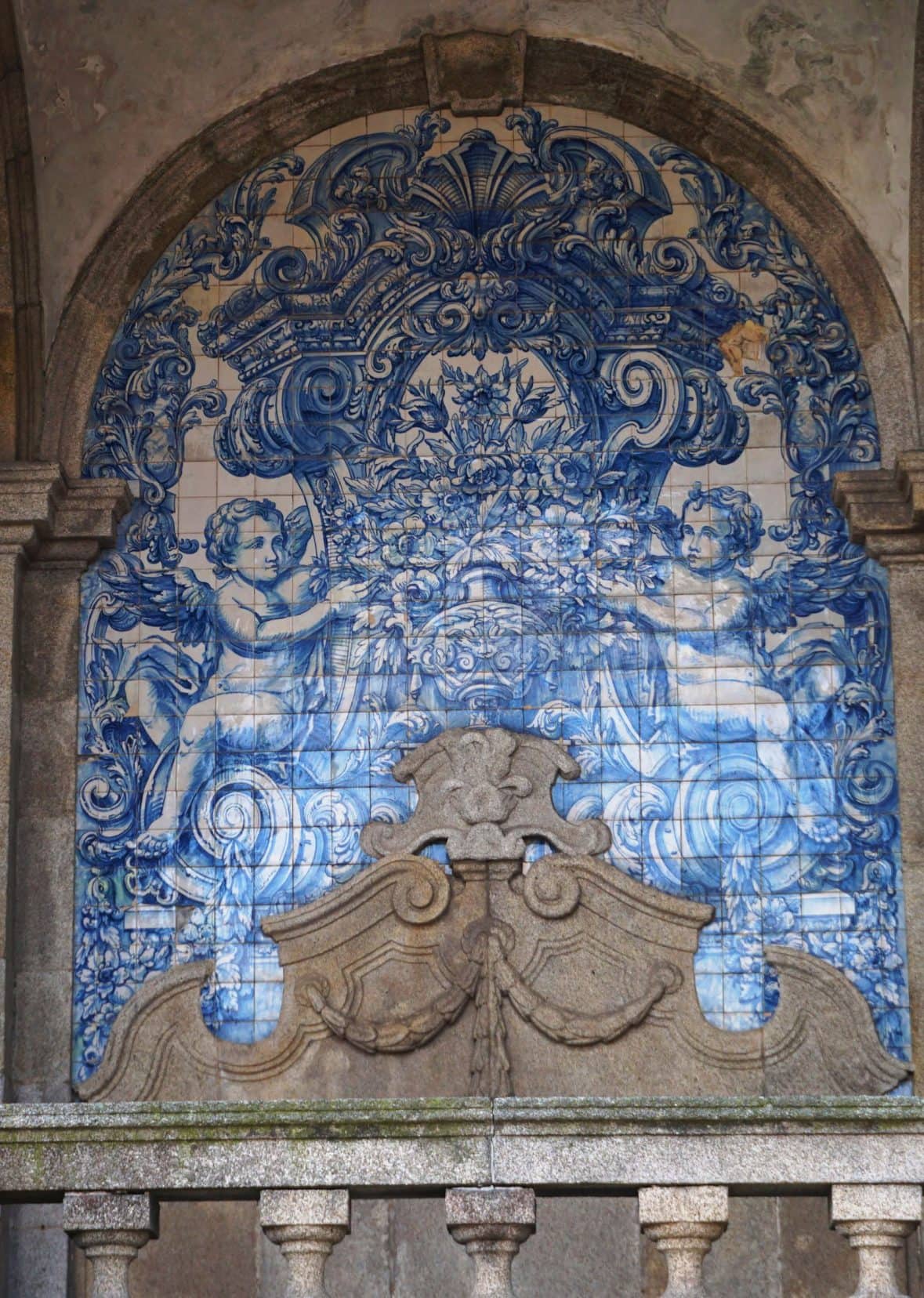 Blue tiled facade on the outside of Porto cathedral