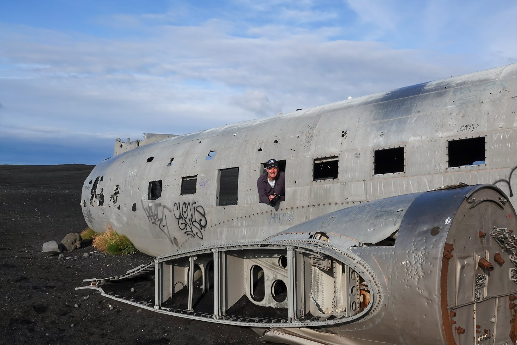 lars poking his head out of the Solheimasandur-plane-wreck-