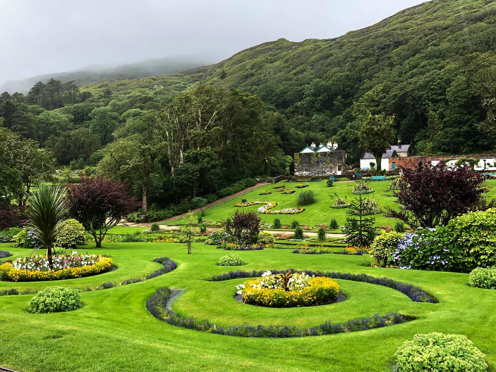 Kylemore-Abbey-walled-gardens with floral displays in circles