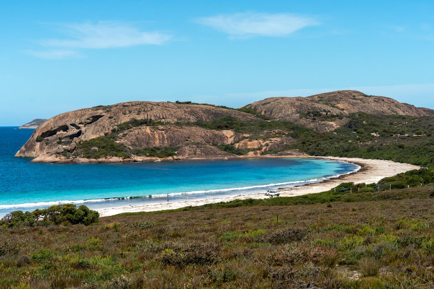 Lucky Bay on a sunny day with bright blue waters 
