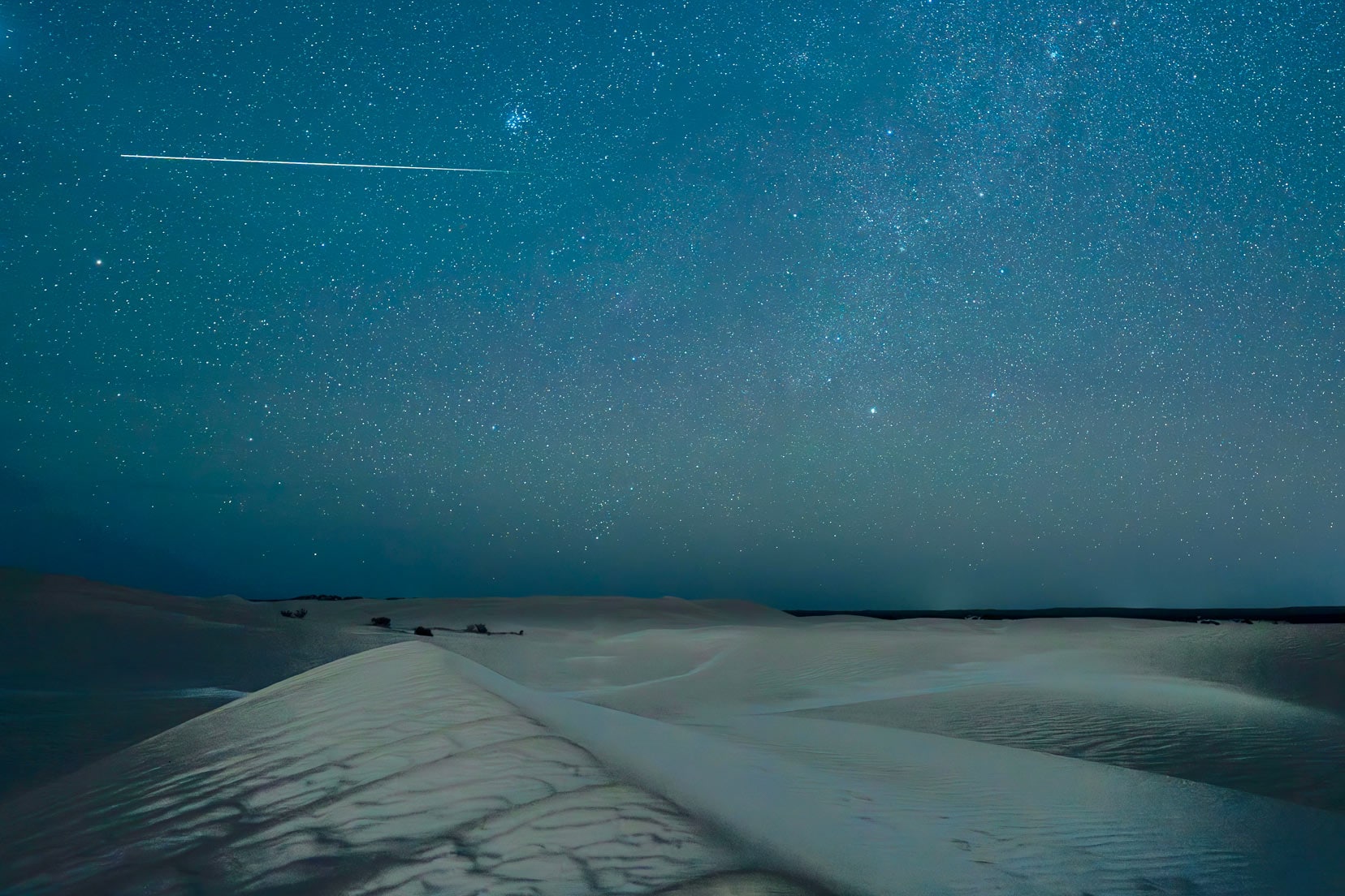 stars-at-lancelin with sand dunes softy lit below 