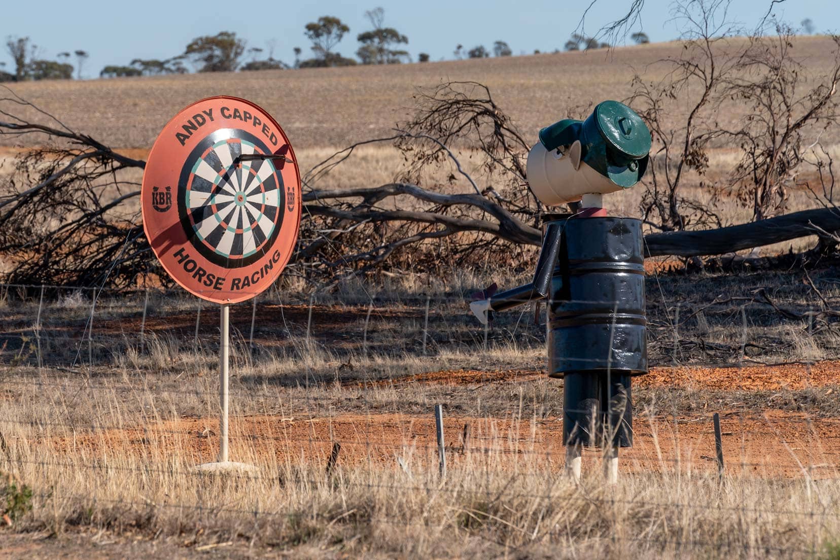 Andy Capp tin horse playing darts on the Tin Horse Highway