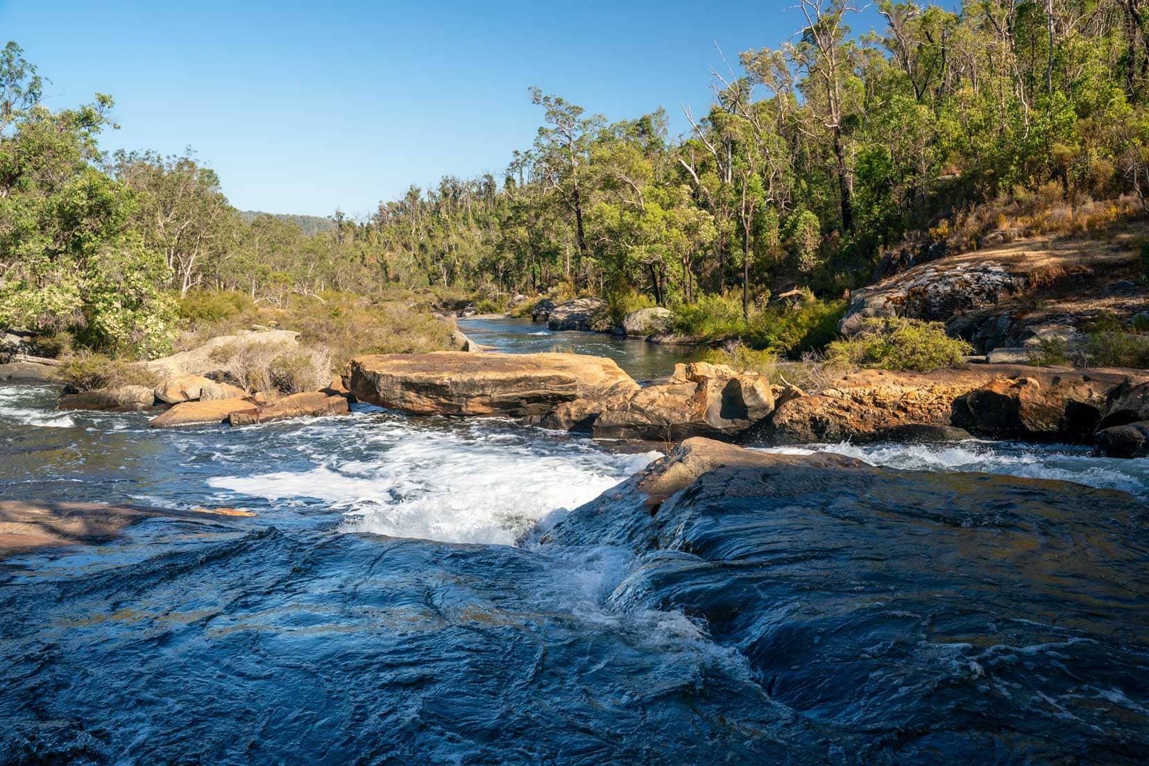 The swirling rapids at Rapids along Lennard Drive 