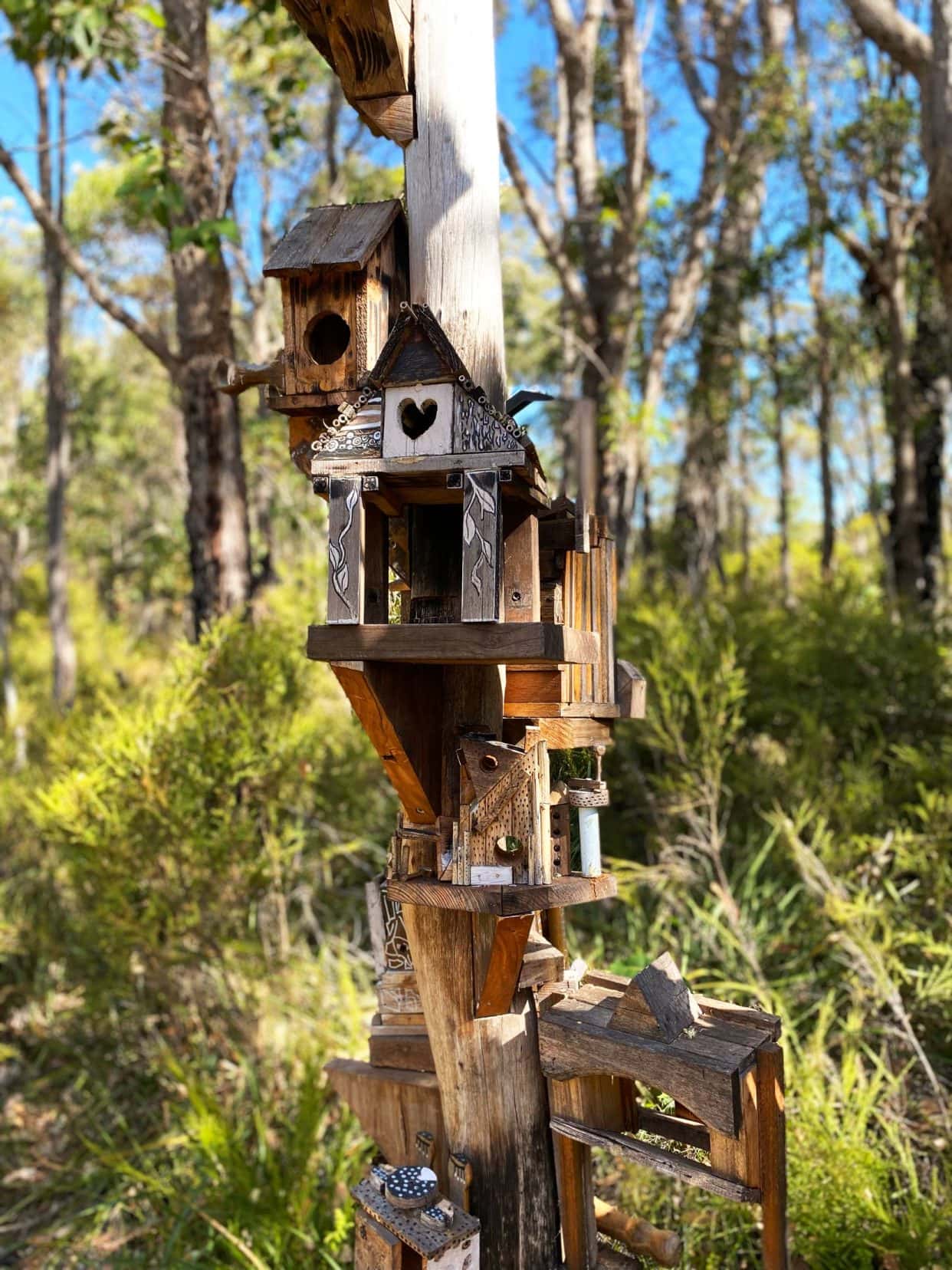 little houses that look a little like bird houses stacked on each other 