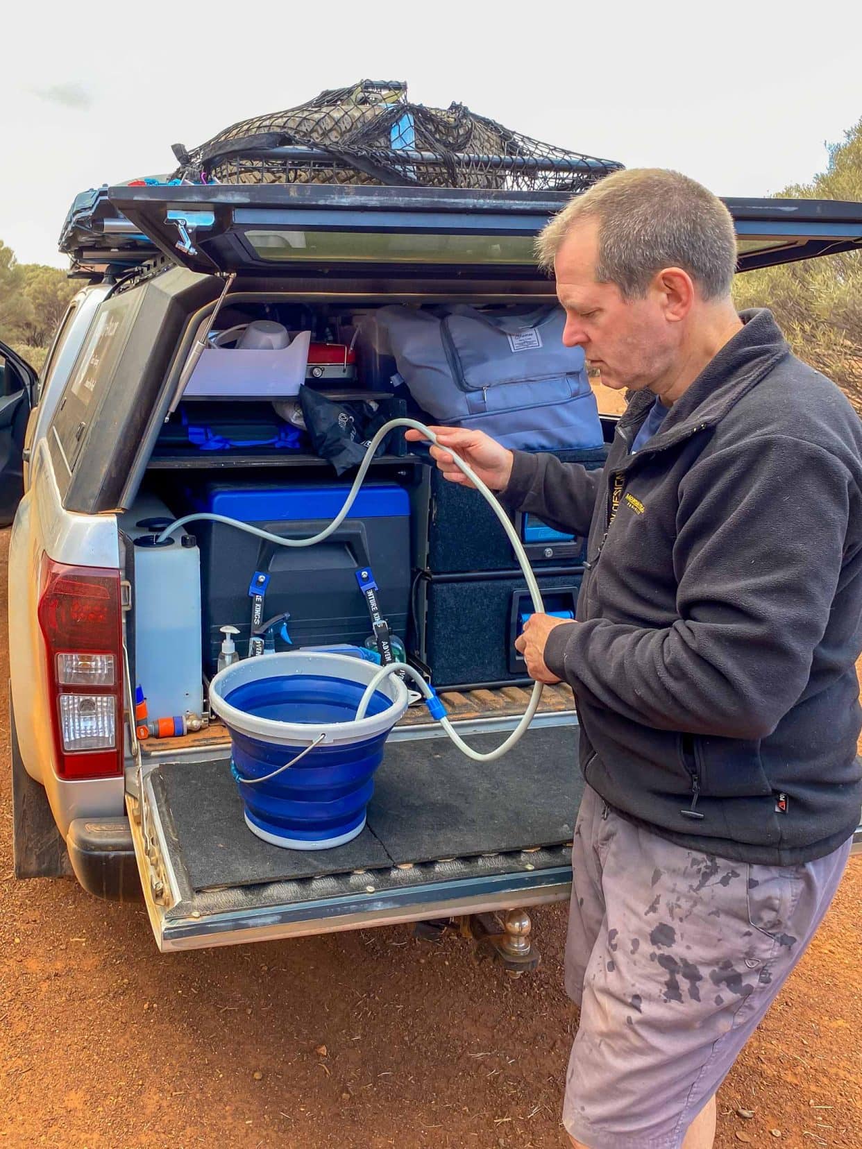 Using-the-camp-shower-to-fill-the-water-tank