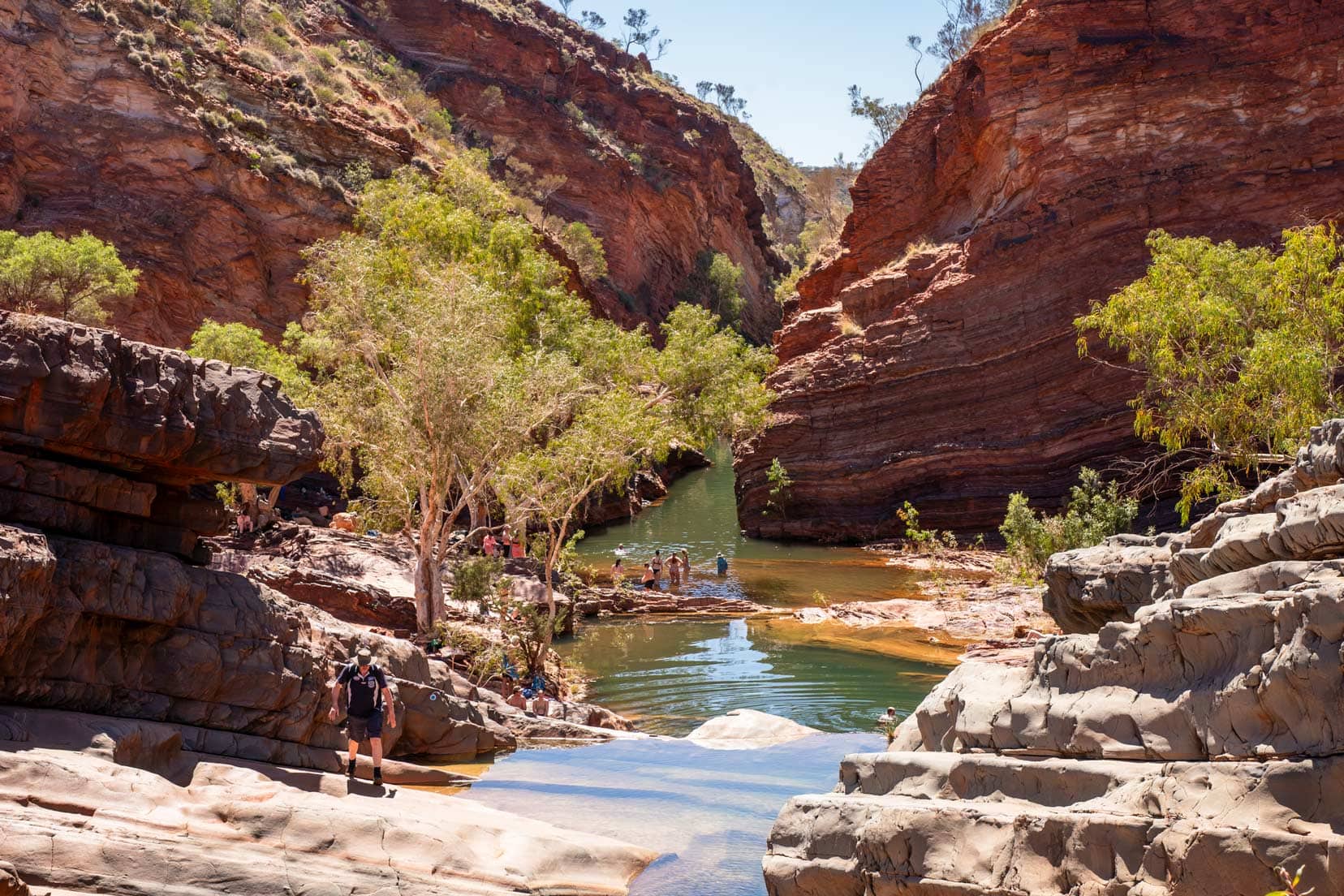 Hammersley Gorge- first up on our Karijini National Park itinerary - green pools surrounded by orange layers of rock on the gorge walls