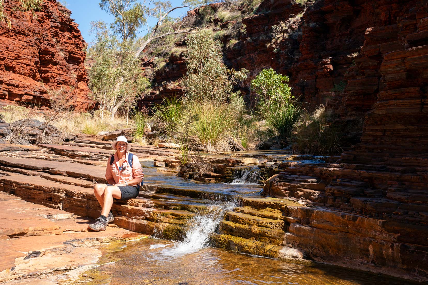 Shelley sat by a small waterfall at Kalamina Gorge